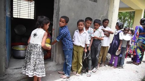 MAHARASHTRA, INDIA July 10, 2015: food serve to rural school children, July 10, 2015, Salunkwadi, Ambajogai, Beed, Maharashtra, India