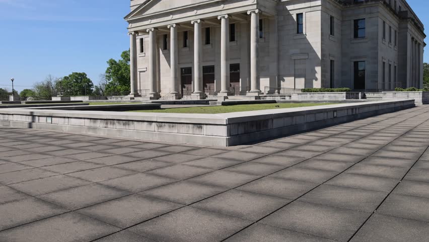 Mississippi state supreme court building in Jackson, Mississippi with video tilting up.