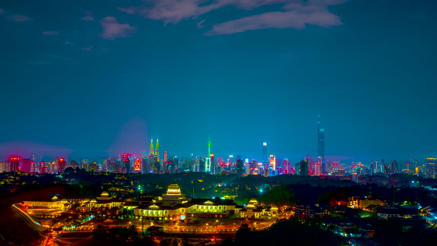 Cityscape Time lapse : Kuala Lumpur city view during night overlooking the city skyline after raining