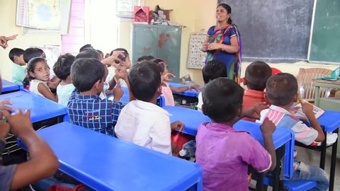 MAHARASHTRA, INDIA July 10, 2015: Rural school children studding in the class, July 10, 2015, Salunkwadi, Ambajogai, Beed, Maharashtra, India