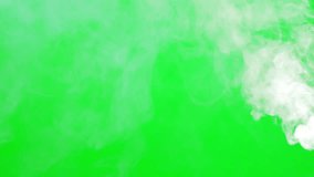 Smoke flowing slow motion on green screen background