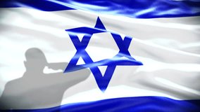 Video Israeli soldier silhouette salutes the Israel Flag, 4K 3D. Concept: IDF, Israel Memorial Day for Fallen Soldiers, Israeli Flag, Israeli soldiers, Remembrance Day, Israel Independence Day