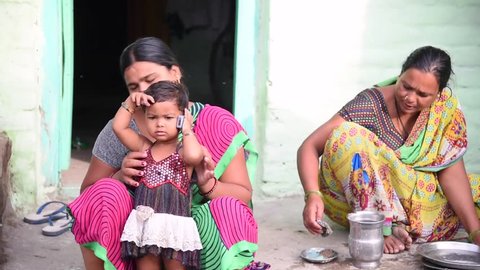 MAHARASHTRA, INDIA July 10, 2015: farm labor women\xD5s daily morning activity, July 10, 2015, rural village Salunkwadi, Ambajogai, Beed, Maharashtra, India