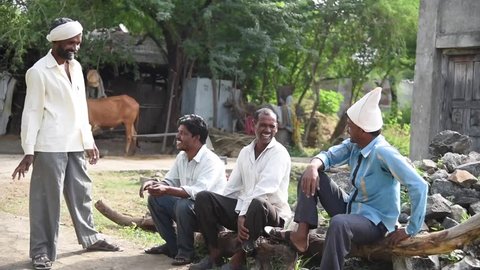 MAHARASHTRA, INDIA July 10, 2015: rural people talking each other, July 10, 2015, Salunkwadi, Ambajogai, Beed, Maharashtra, India