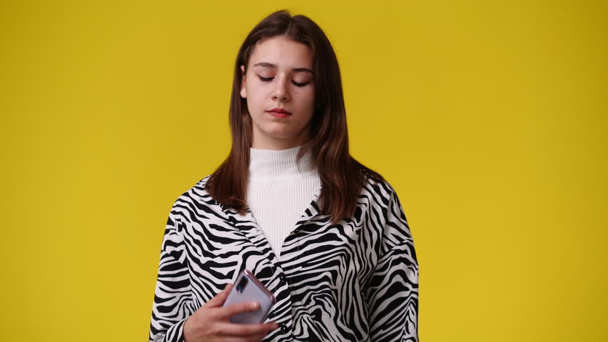 4k video of one girl having a talk over the phone.