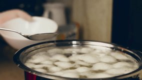Contour effect of Boiled potatoes in boiling water in a saucepan on a gas stove. Selective focus. 4k video recording