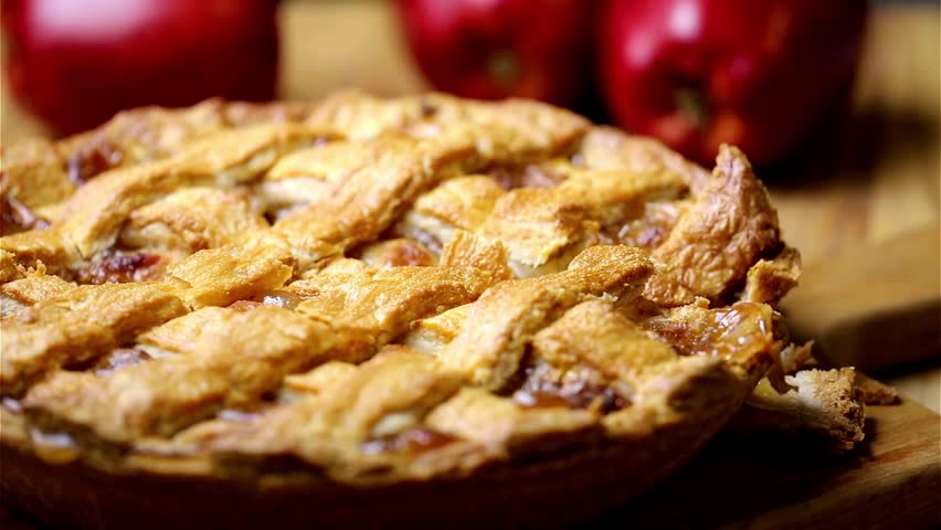 Sweet Slices: Closeup Temptation of Cutting into a Scrumptious Apple Pie Royalty-Free Stock Footage #1103477611