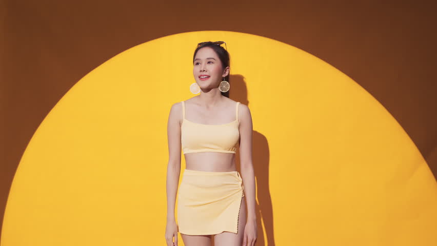 ready to fight the sun,confident asia woman wear summer dress cloth and sun glasses taking of her glasses with smiling delightful cheerful face expression,casual relax woman travel ready to go out