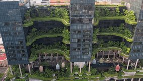 Aerial view of the famous hotel in Singapore. This building has a jungle like green facade. - Powered by Shutterstock - Get 15% off with code: PIKWIZARD15