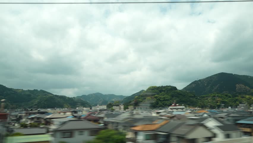 View of rural area from the window of the Shinkansen Bullet Train, Japan