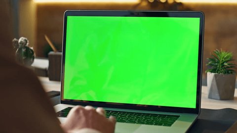 Unknown worker scrolling touchpad green screen laptop at modern workplace close up. Manager hand using computer keyboard searching data in internet indoors. Businessman working at mockup notebook. – Video có sẵn