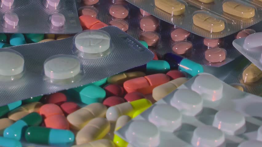 Medical Tablets and Capsules in Macro Footage - Stock Video, Pharma Industry, Medical Research, Drug Development, Used for Presentations and Educational Purposes Royalty-Free Stock Footage #1103517993