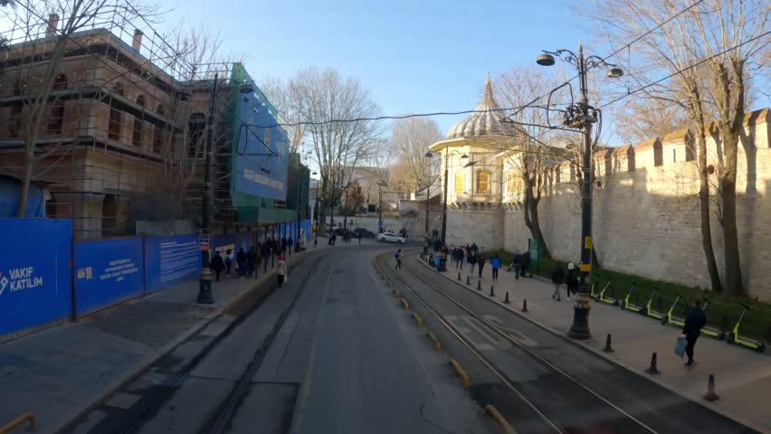 Modern tram on the street of istanbul. Road trip in istanbul. View of Istanbul from the car window. View of the streets of istanbul from a car
