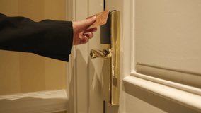 Close up view of formally dressed female girl in Luxury modern room corridor. Woman opens the door to hotel room, using NFC key card, check in to the apartment. Arriving on business trip. 4k - Powered by Shutterstock - Get 15% off with code: PIKWIZARD15