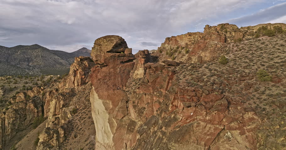 Terrebonne Oregon Aerial v51 low flyover Smith Rock State Park capturing nature landscape and unique landmark rock column with distinctive monkey face shape - Shot with Mavic 3 Cine - August 2022