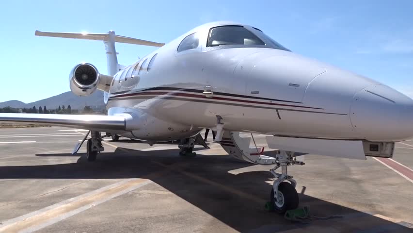 Private Jet Slow Left Panning from Fuselage to Wing of Business Jet