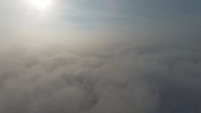 Flying over the mountains.,Aerial flight above clouds in mountains in autumn morning landscape time lapse hyperlapse