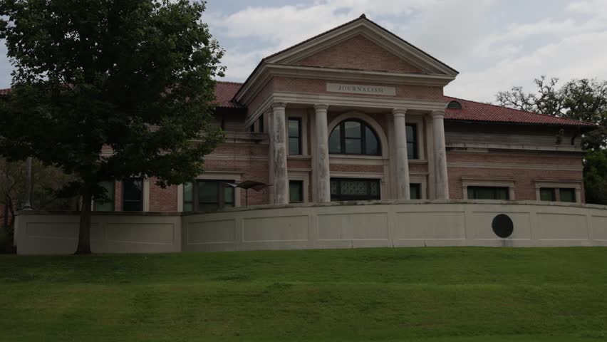 Manship School of Journalism building on the campus of Louisiana State University in Baton Rouge, Louisiana with stable establishing shot.