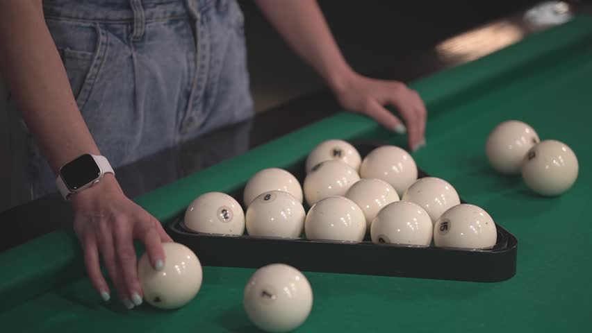Russian billiards. Woman stacks billiard balls.close-up of billiard balls. Slow video. High quality Full HD video recording | Shutterstock HD Video #1103574331