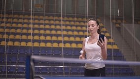 Table tennis, a woman player hits the ball with a racket. woman dropped table tennis ball.slow motion video. High quality Full HD video recording
