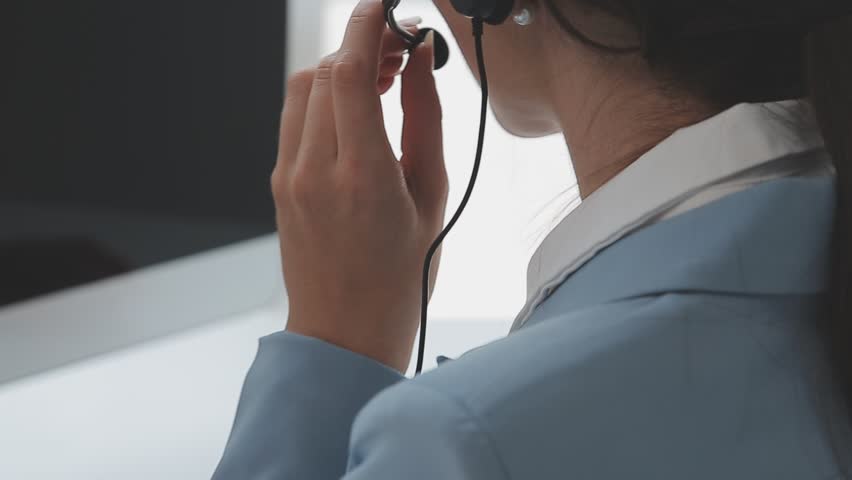 Young customer service representative wearing headset in office

 | Shutterstock HD Video #1103578457