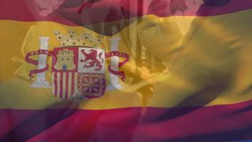 Animation of waving spanish flag over female surgeon tying surgical mask on male surgeon at hospital. Medical healthcare technology concept - Powered by Shutterstock - Get 15% off with code: PIKWIZARD15