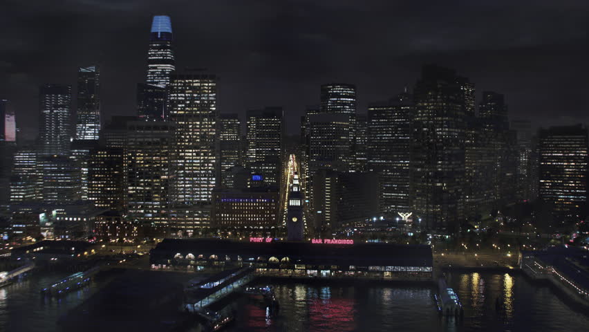 Lightning Storm Strike over San Francisco at Night. Aerial View of City Skyline and Market Street with Traffic. Thunderstorm.  Climate Change.