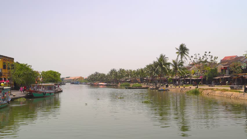 River running through Hoi An, Vietnam during day time