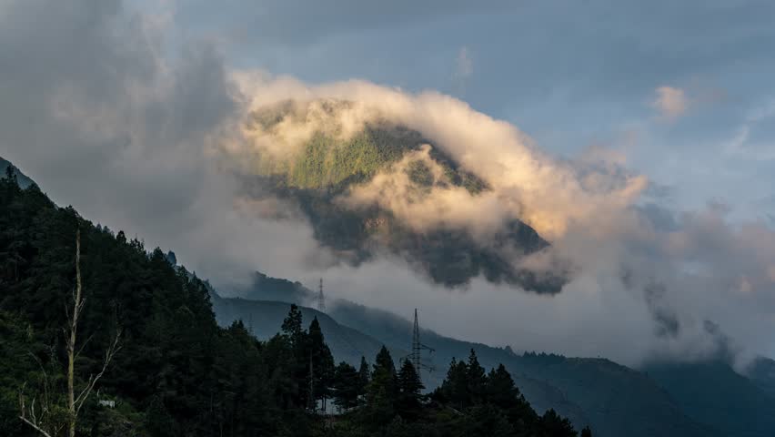 Timelapse footage of eautiful volcanoes in the city of Banos, Ecuador. Amazing sunset.