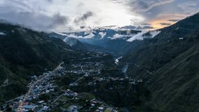 Aerial hyperlapse footage of beautiful  Ecuadorian Andes at sunset. City of Banos.