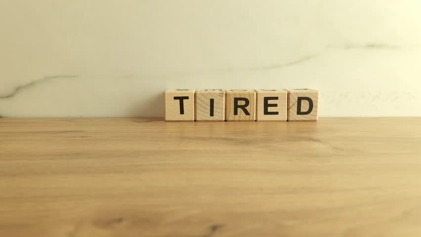 Changing word tired into retired. Retirement concept Royalty-Free Stock Footage #1103591489