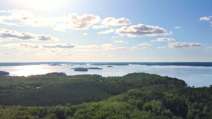 Flying over Pelican Lake and forest in Northern Minnesota.
