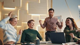 Successful creative team giving high five rejoicing business achievement company development in conference room. Happy young coworkers celebrating project success in office boardroom. People success - Powered by Shutterstock - Get 15% off with code: PIKWIZARD15