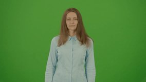 Green Screen. Chroma Key. Cute Pretty Woman Smiling Feeling Happy, Showing Positive Face Emotions. Woman Wearing in Blue Shirt