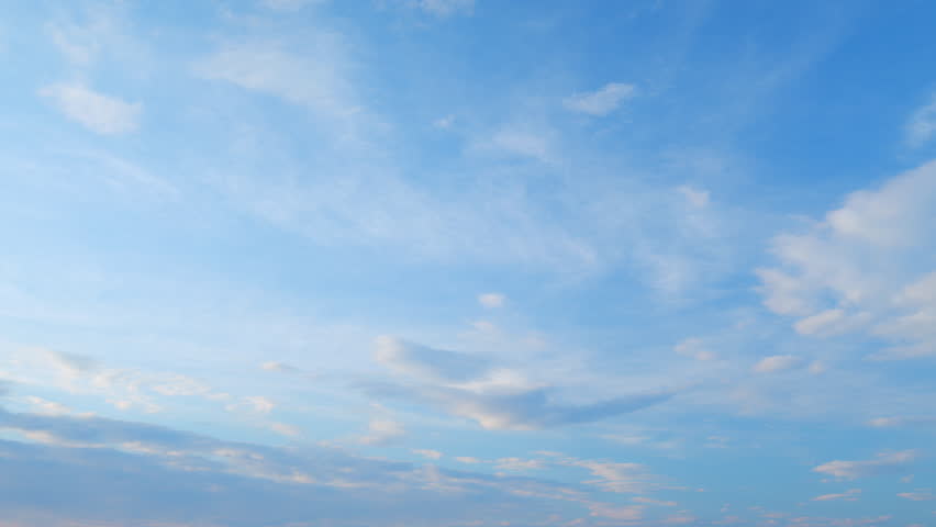 Flying moving white clouds in a blue sky. Blue sky background with many layers tiny stratus cirrus clouds. Time lapse. Royalty-Free Stock Footage #1103599665
