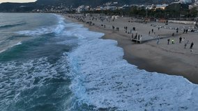 Concept of active tourism and travel. Aerial drone view of paddle man on sup board at mountain lake during sunset.Aerial view of the sea surface sports recreation on the water on a green board. - Powered by Shutterstock - Get 15% off with code: PIKWIZARD15