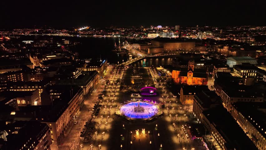 An aerial view of Stockholm city illuminated at night