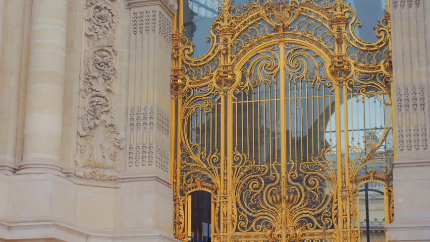 Golden Wrought-iron Entrance Gate Of Petit Palais, An Art Museum In Paris, France. closeup