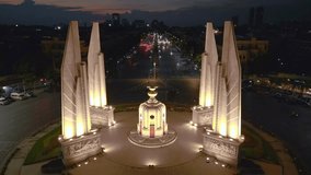 Illuminated large traffic circle with columns. Lovely aerial view flight drone