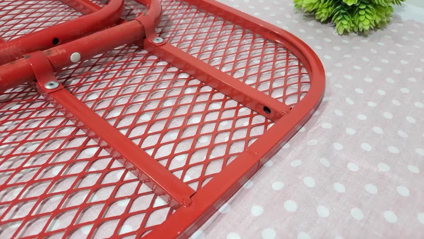 Close up of woman hands tracing lines on fabric for iron board cover