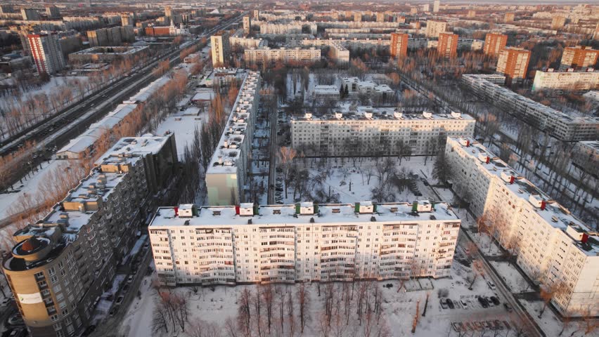Aerial view. Winter panorama of the city of Tolyatti in the Samara region. Snow-covered streets of a provincial and industrial Russian city. Royalty-Free Stock Footage #1103646885