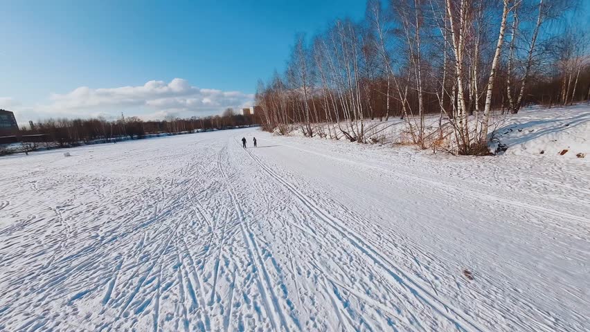 Nizhny Novgorod, Russia, January 31, 2023. FPV shooting of skiers, aerial shooting of skiers, cross-country skiing