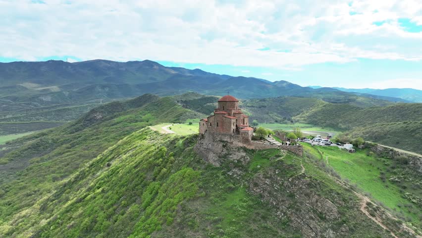 Ancient Jvari Monastery On Top Of A Mountain Near Mtskheta In Eastern Georgia - aerial orbit Royalty-Free Stock Footage #1103668521