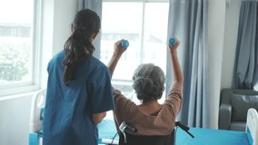 Asian senior care nurses and grandmothers provide caring support to elderly women hand clasp to encourage exercising with elder disabled person patient with caregiver in nursing care. - Powered by Shutterstock - Get 15% off with code: PIKWIZARD15