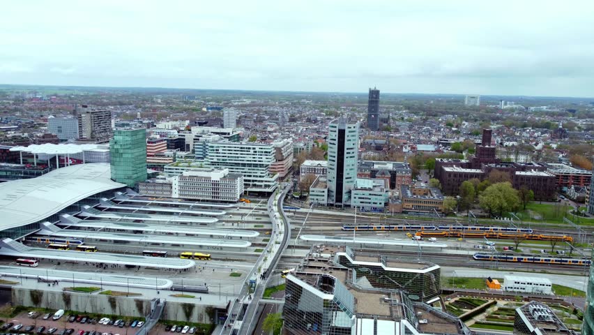 Trains Arriving At Utrecht Centraal Station In Utrecht, Netherlands. - aerial