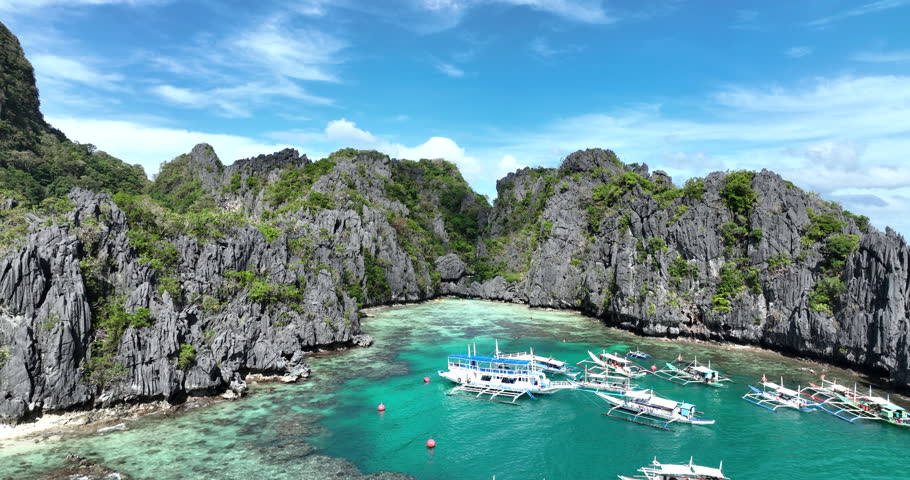 Aerial view of the amazing Big Lagoon in El Nido, Palawan, Philippines Royalty-Free Stock Footage #1103688779