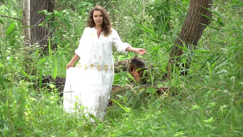 Slow Motion Beautiful healthy happy girl enjoying freedom outside in nature