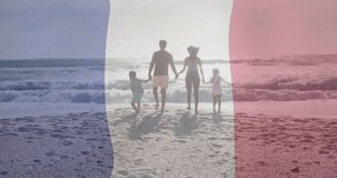 Animation of flag of france over biracial couple with children walking at beach. Bastille day, fete nationale francaise, patriotism and celebration concept digitally generated video.