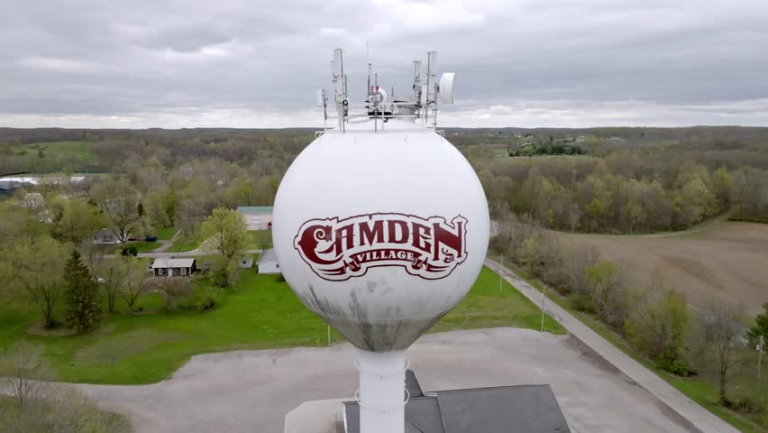 Camden, Michigan water tower with drone video pulling back.