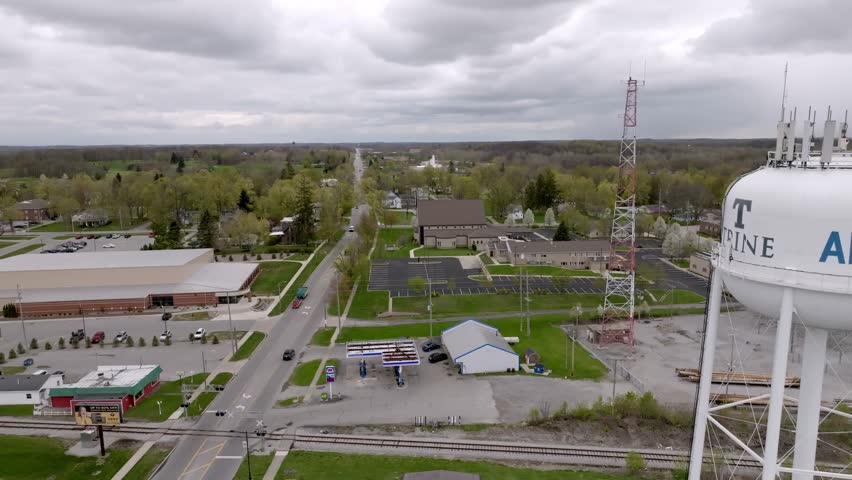 Angola, Indiana water tower with drone video moving left to right.